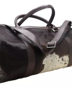 Duffle Bag for men/Women, Cowhide Travel bag , Gym and Beach Bag , Custom made large bag, Weekend holdall bag. Gift for her , for himPlease note that these measurements are before trimmings . Actually small size cut down when we make a shape of cowhide rug. World Best Quality and Unique Product !!!! It's handmade with pure natural material. Specila Gift for lovd Ones Cowhide front exterior door - COLOR: Brown and White - LEATHER, ZIPPER AND DETAILING - Zipper Pocket Inside - Fully Lined INTERIOR - Extendable shoulder strap - MEASURES APPROXIMATELY 20inch X12inch X10inch - Handle to Carry on Shoulders PICTURES ARE FOR ILLUSTRATION PURPOSE ONLY. DUE TO THE NATURAL PATTERNING OF EACH COWHIDE EACH BAG IS UNIQUE.